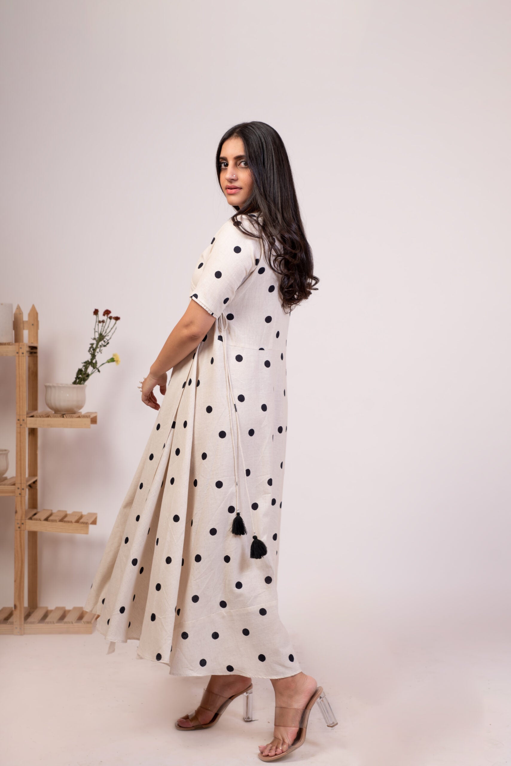 Elegant white polka dot dress for women with short sleeves and a flowy silhouette