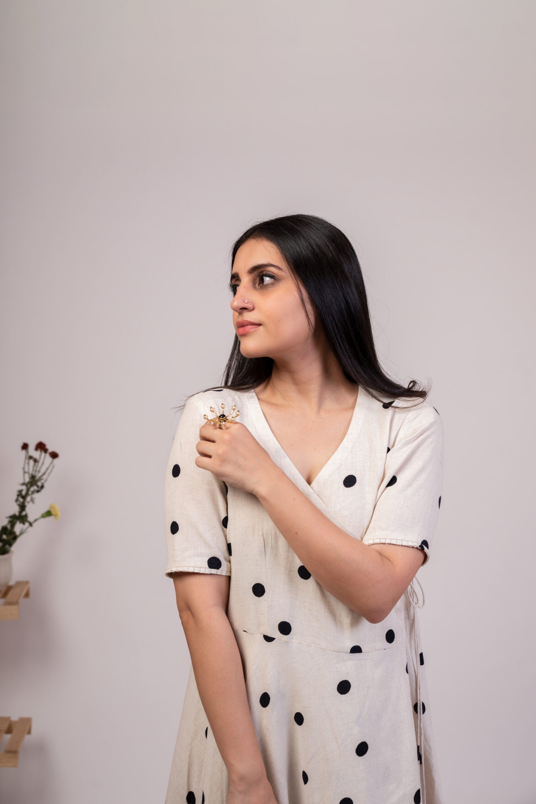 Elegant white polka dot dress for women with short sleeves and a flowy design