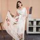 Elegant white saree with pink floral print styled by Stylera for a chic look
