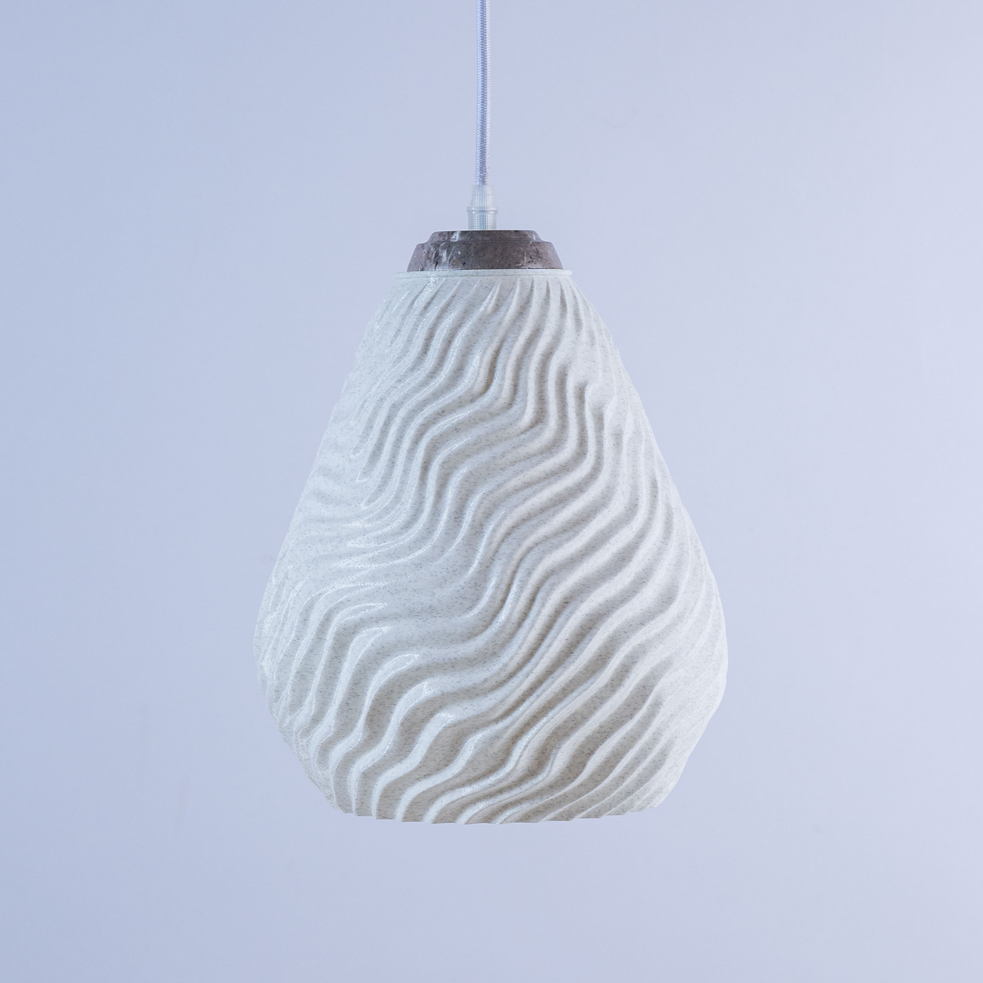 Stylish white sculptural hanging light with textured wave design for modern decor