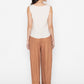 Back view of white sleeveless blouse paired with brown wide-leg pants