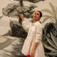 Stylera white tunic top casual wear with button-down design and flared silhouette for relaxed style
