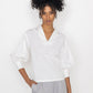 Stylera white v neck blouse for women with three quarter puff sleeves and relaxed fit