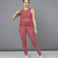 Stylish women's mesh workout top in rose pink, perfect for activewear and gym sessions