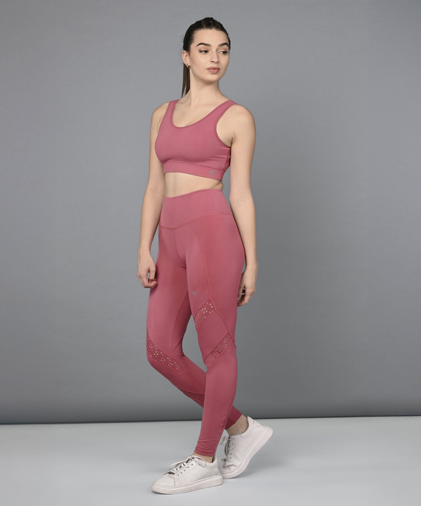 Stylera women's mesh workout top in pink designed for comfort during fitness activities