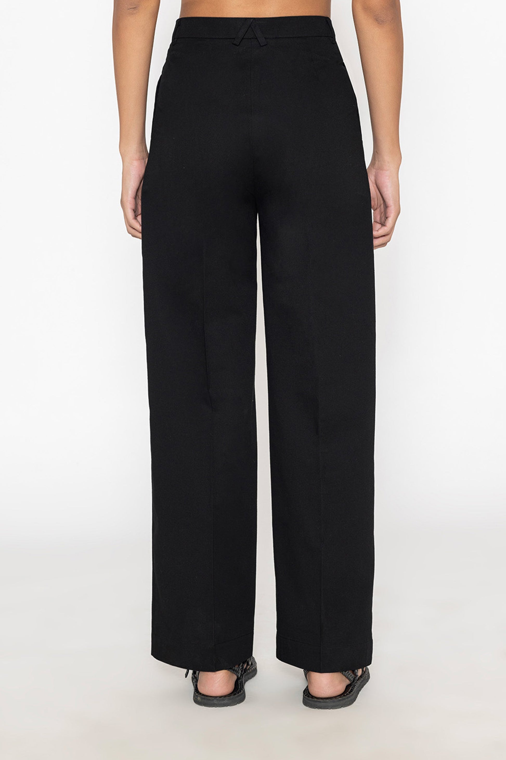Stylera women's black wide leg trousers shown from the back with a relaxed fit and high waist