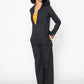 Stylera women's black wide leg trousers styled with black top and sunglasses