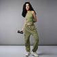 Model in women's cargo parachute pants with crop top, styled in olive green for a trendy look