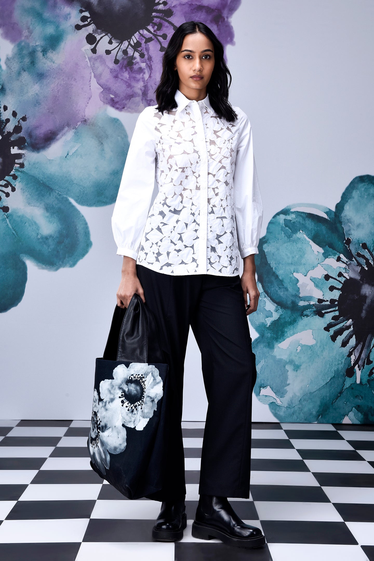 Model wearing Stylera women's casual chic white shirt with lace front and balloon sleeves