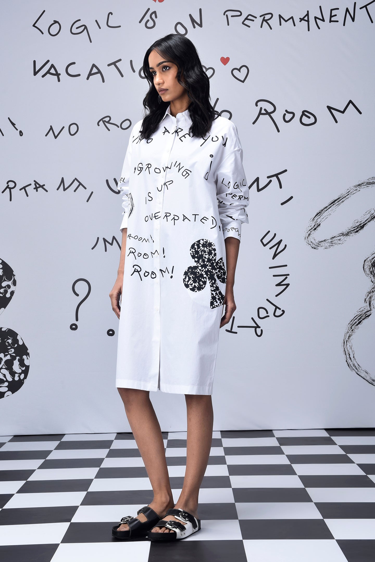 Stylera white knee-length women’s casual shirt dress with print black handwritten motifs and clover detail