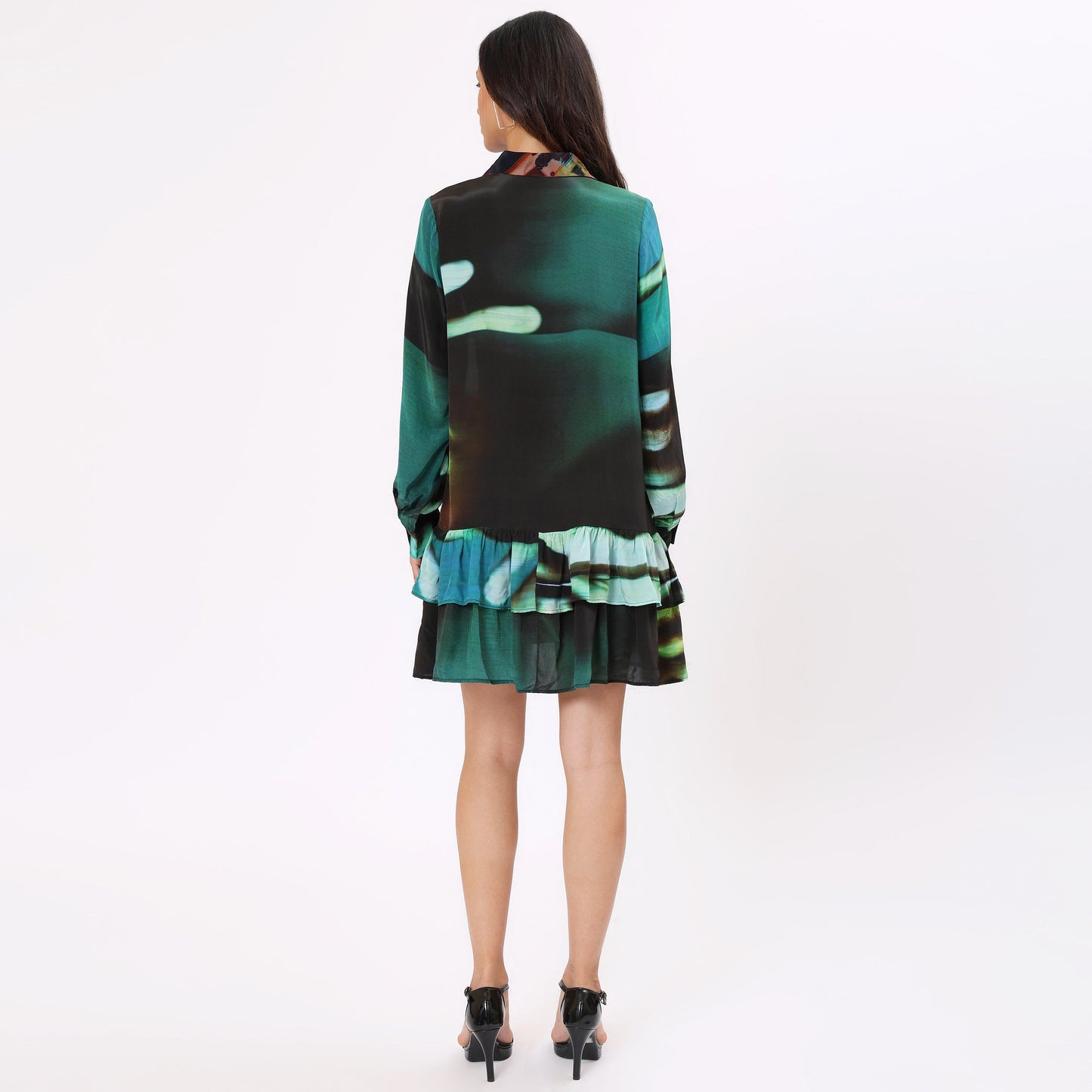 Back view of Stylera women's casual statement dress in vibrant colors with a ruffled hemline