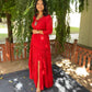 women's elegant long dress in red with tiered design and a side slit for stylish occasions