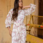 Elegant women's floral dhoti style dress with puff sleeves and fitted waist for a stylish look