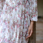 Elegant women's floral dhoti style dress with delicate floral patterns and flowing fabric