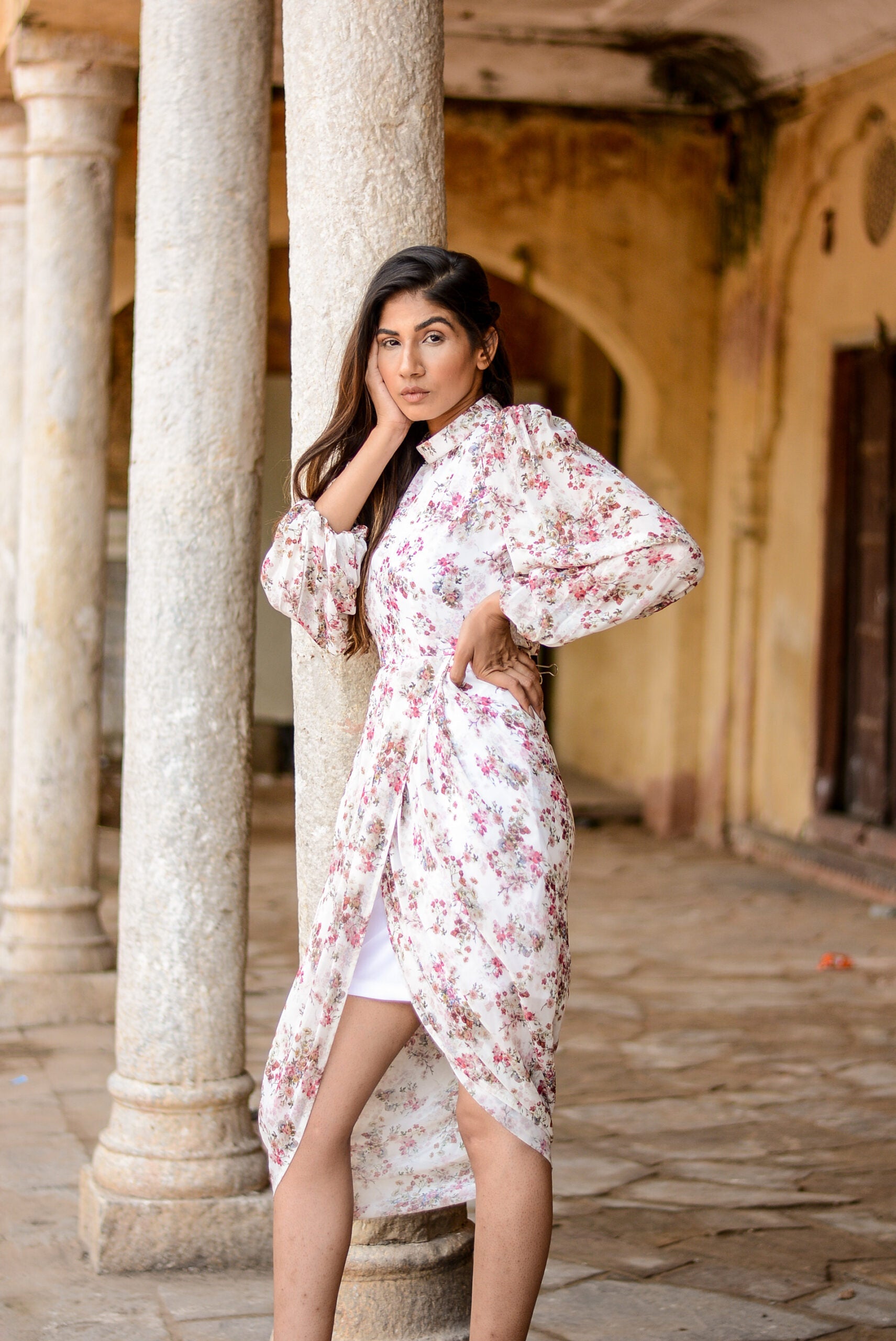 Model wearing a stylish women's floral dhoti style dress, showcasing flowing fabric and elegant design