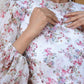 Elegant women's floral dhoti style dress with billowy sleeves and a chic neckline