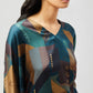 Stylera women's geometric print lounge set featuring a colorful abstract pattern on soft fabric