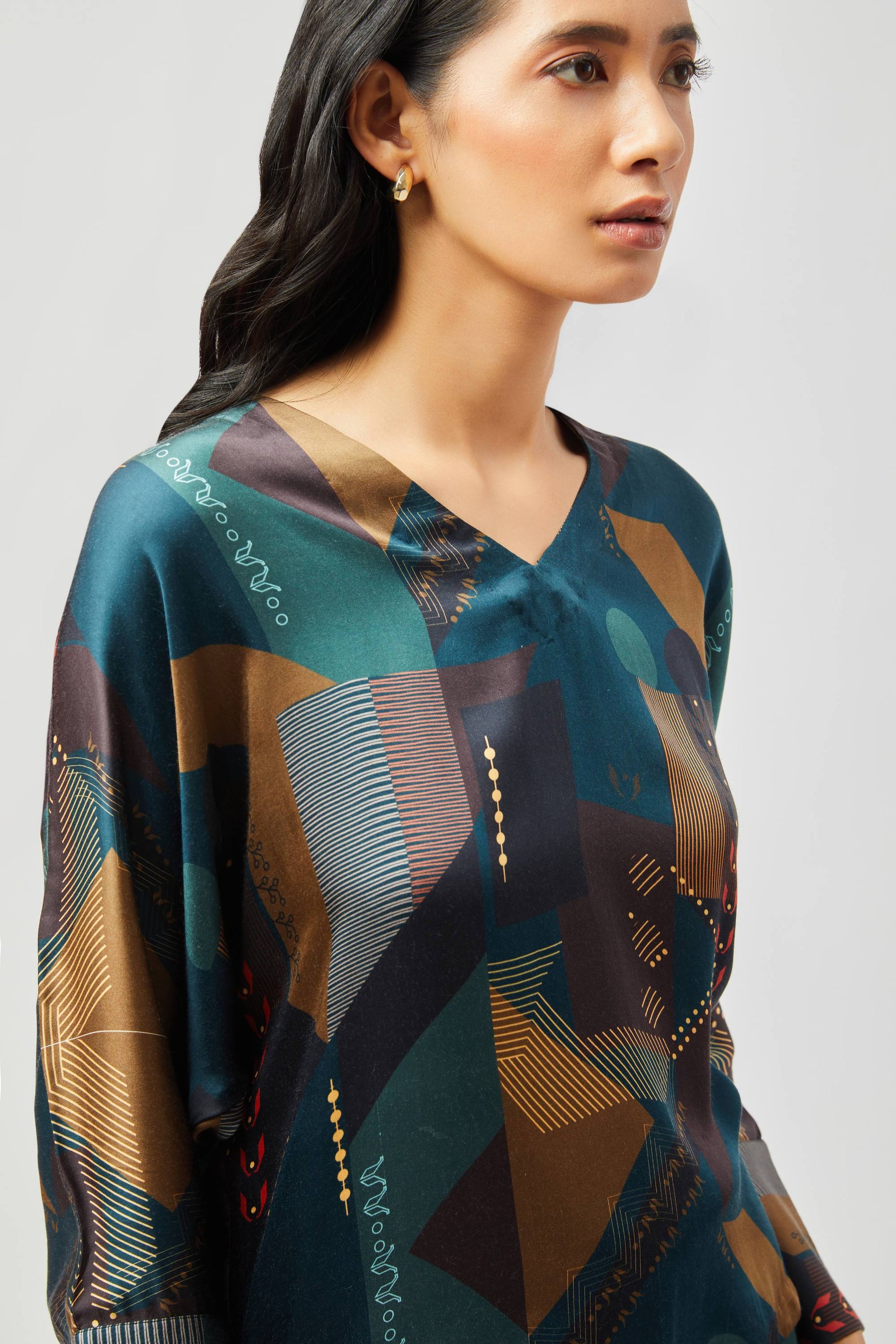 Stylera women's geometric print lounge set featuring a colorful abstract pattern on soft fabric
