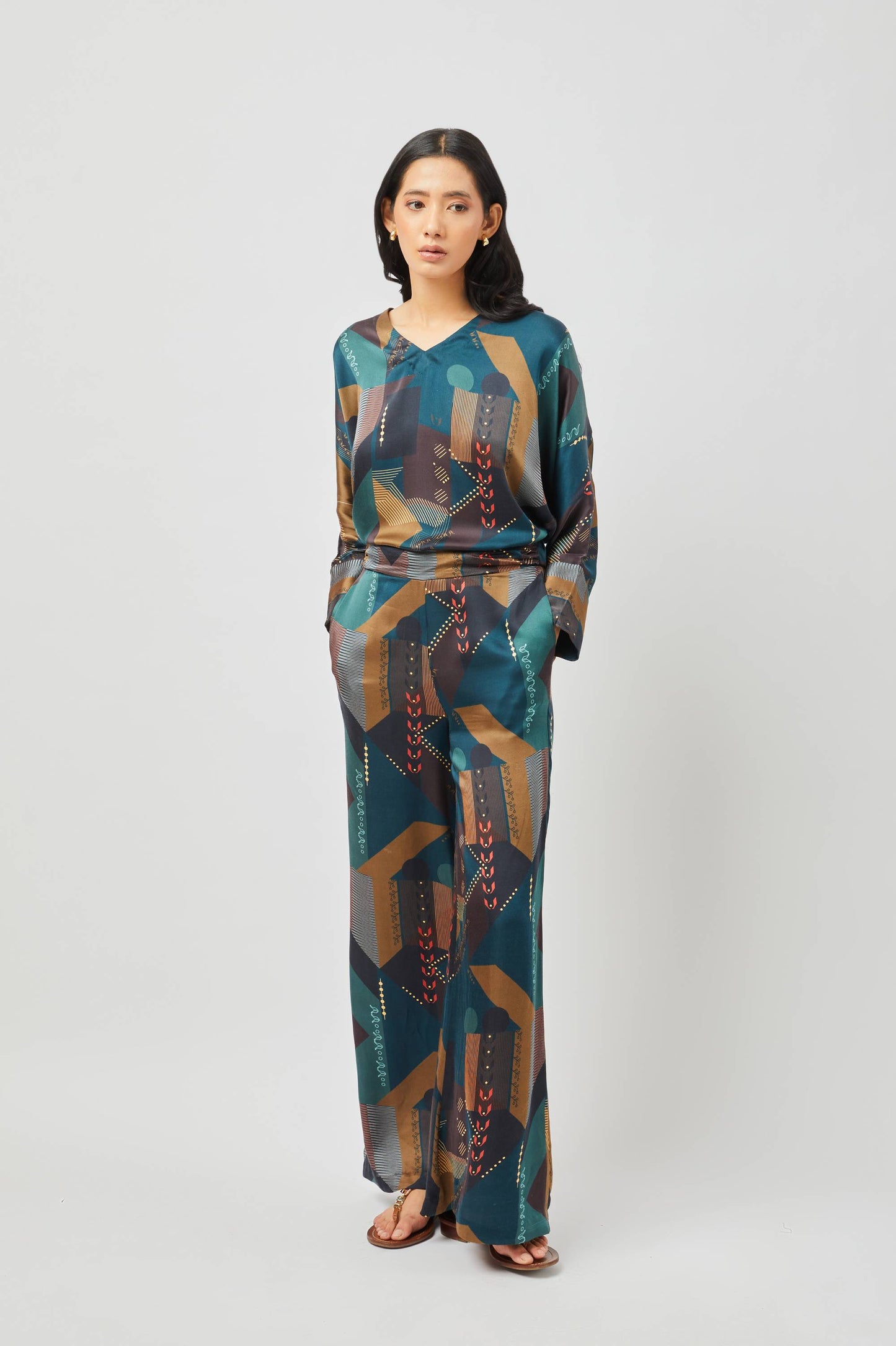 Stylera women's geometric print lounge set featuring a long-sleeve top and matching wide-leg pants