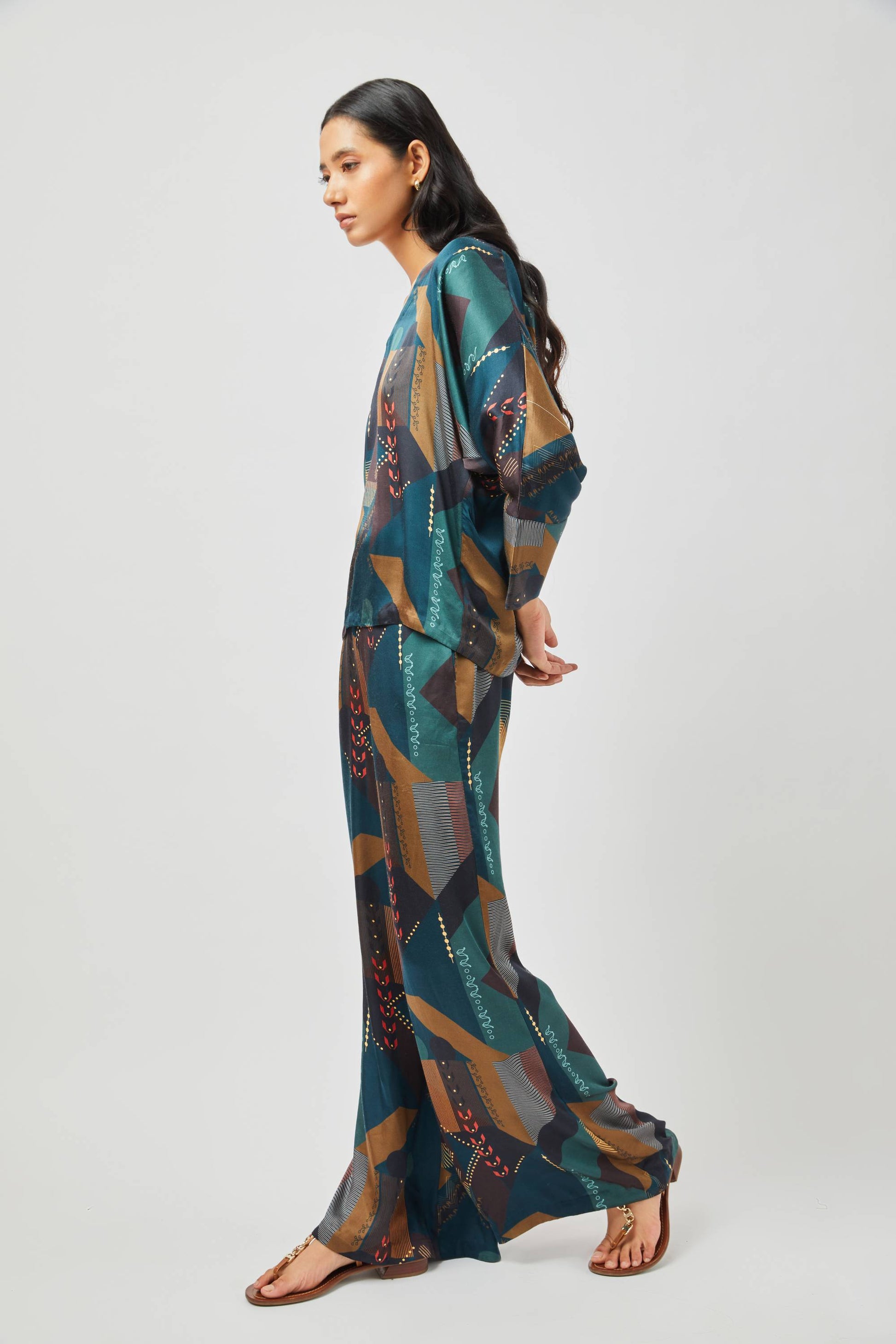 Stylera women's geometric print lounge set featuring a relaxed fit with teal and brown abstract patterns