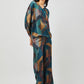 Stylera women's geometric print lounge set featuring a relaxed fit top and wide-leg pants
