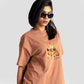 Stylera womens graphic oversized mocha tee featuring a relaxed fit and cartoon graphic on the front