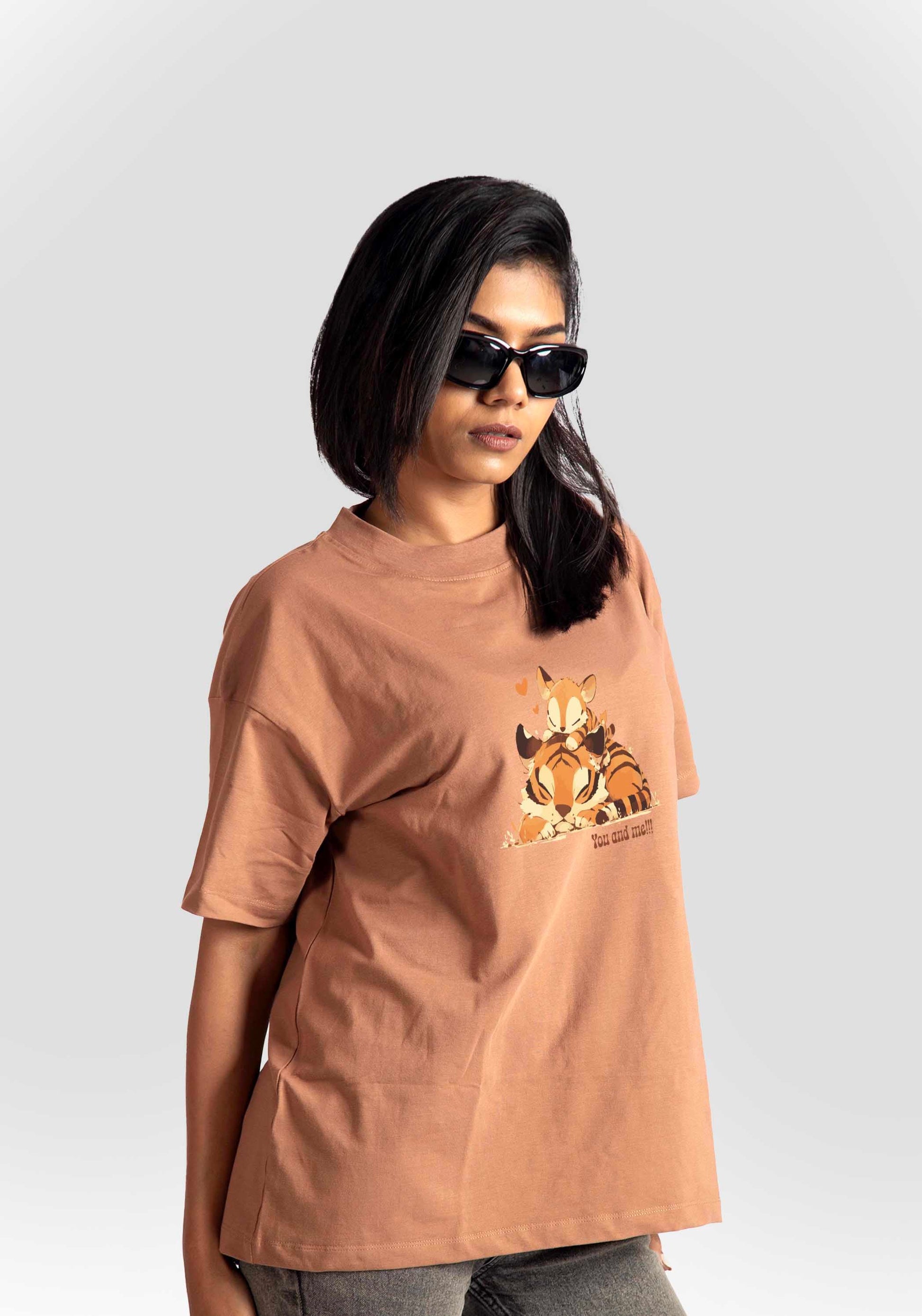 Stylera womens graphic oversized mocha tee featuring a relaxed fit and cartoon graphic on the front