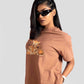 Womens graphic oversized mocha tee by Stylera with cartoon print and relaxed fit