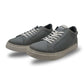 Women's grey canvas sneakers with classic design and lace-up closure for everyday wear