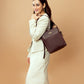 Stylish Stylera women's leather shoulder bag showcased on a model in a chic outfit