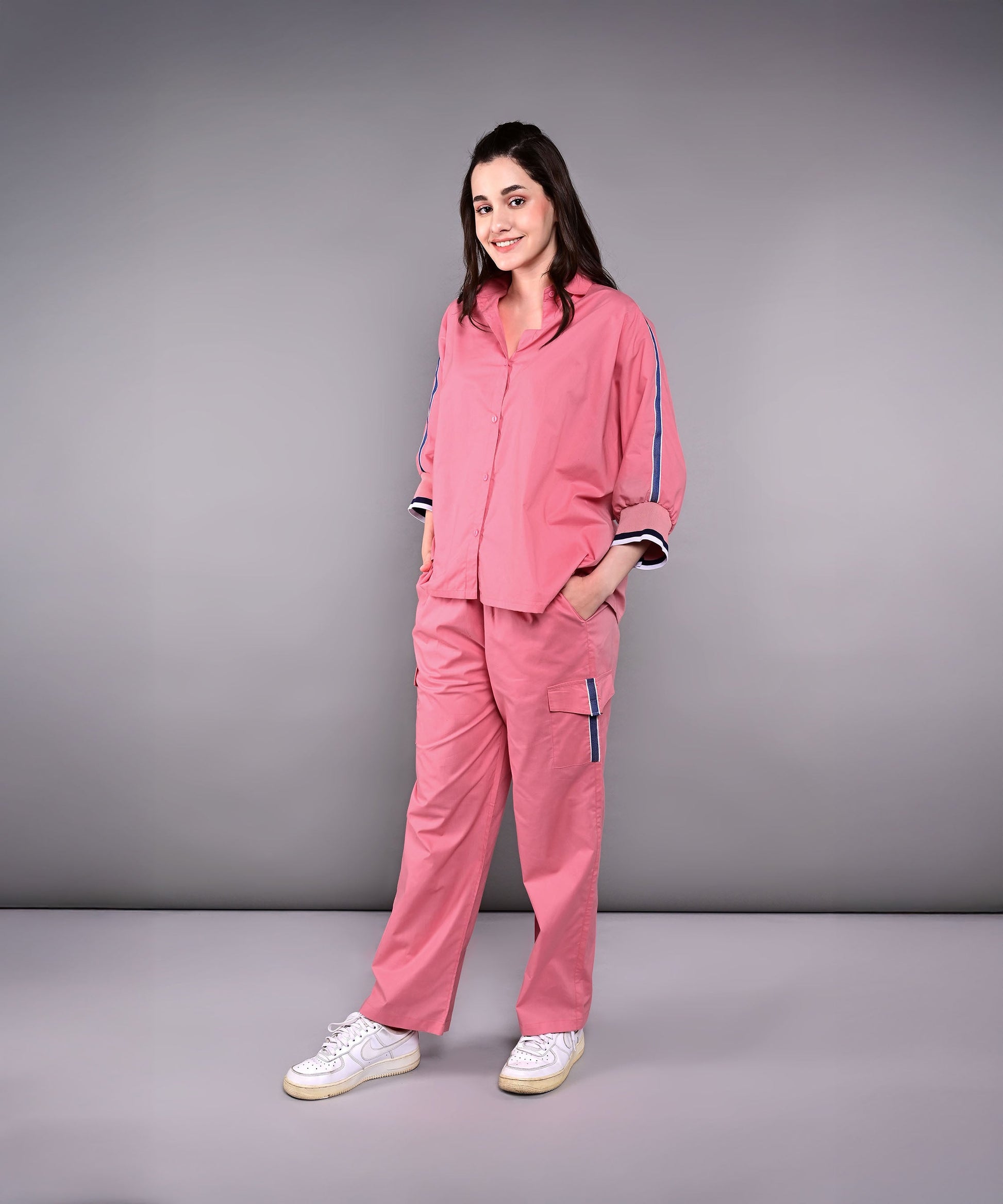 Women's pink lounge set from Stylera featuring a relaxed fit and stylish design for comfortable wear