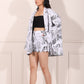 Stylish women's printed blazer shorts set with unique graphic design and chic silhouette