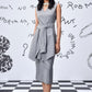 Stylera sleeveless gray belted midi dress on model with layered tunic skirt women's trendy wool dresses