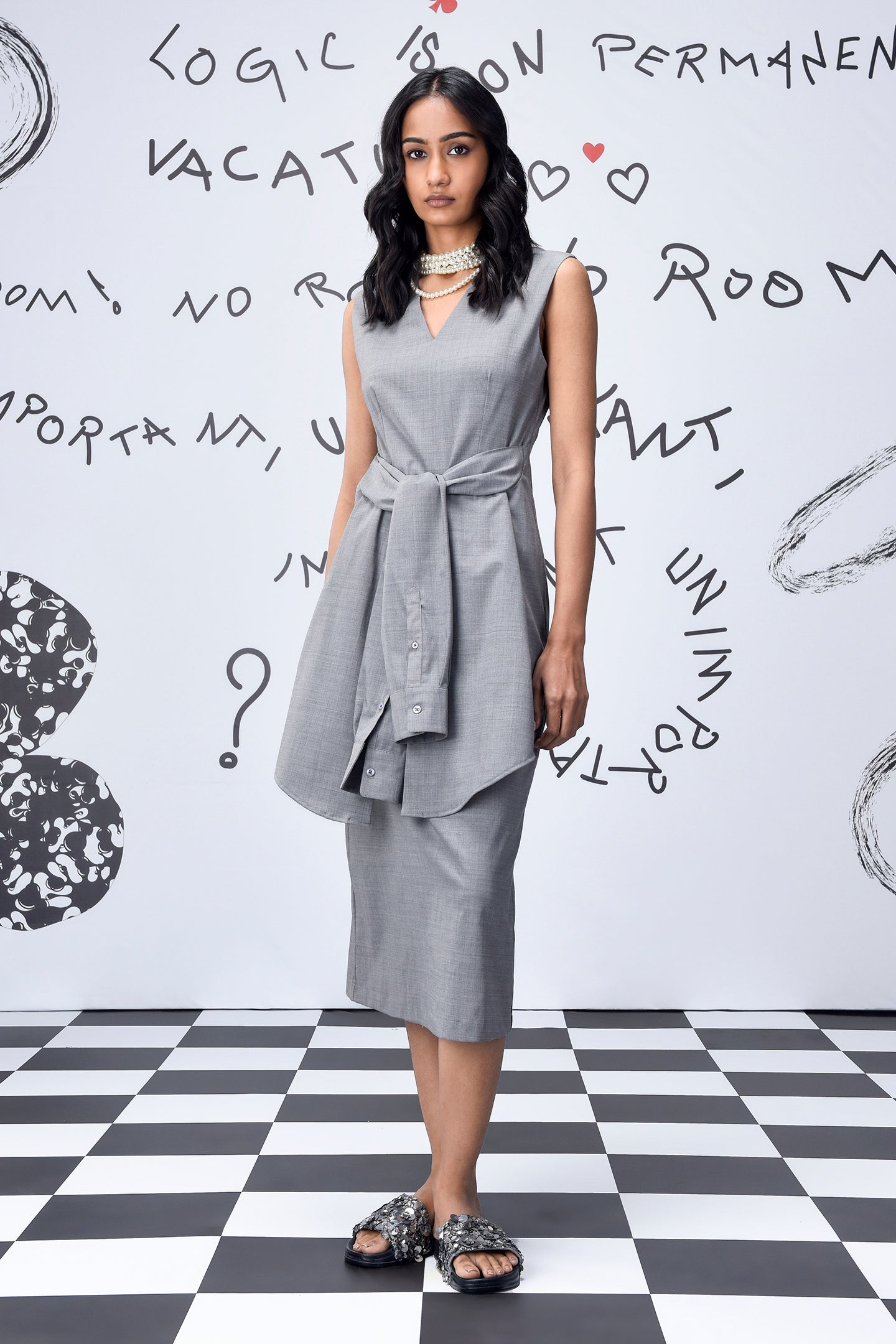 Stylera sleeveless gray belted midi dress on model with layered tunic skirt women's trendy wool dresses