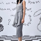 Stylera gray sleeveless midi dress with tie belt on model in studio women's trendy wool dresses