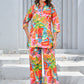 Vibrant women’s tropical print co-ord set featuring a colorful top and matching wide-leg pants
