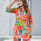 Colorful women’s tropical print co-ord set featuring vibrant floral patterns and a stylish design