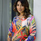 Stylera women's vibrant nightwear set featuring a colorful floral design and relaxed fit