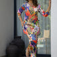 Stylish Stylera women's vibrant nightwear set in colorful floral design, perfect for a cozy night in
