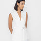 Stylera women's white sleeveless vest with a belted waist and deep V-neck design