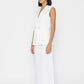 Stylera women's white sleeveless vest with belt detail styled with white skirt and black shoes