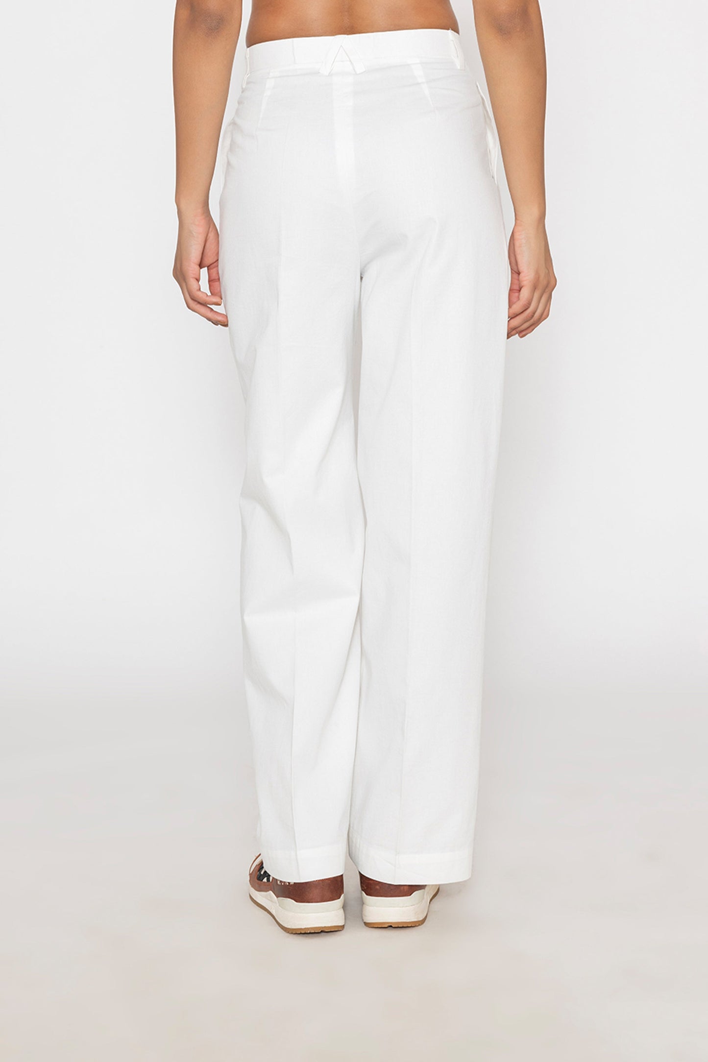 Stylera women's white wide leg trousers shown from the back with a relaxed fit and high waist