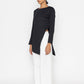 Stylera women's white wide leg trousers paired with black asymmetrical top and headscarf
