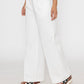 Stylera women's white wide leg trousers with a high waist styled with casual sneakers