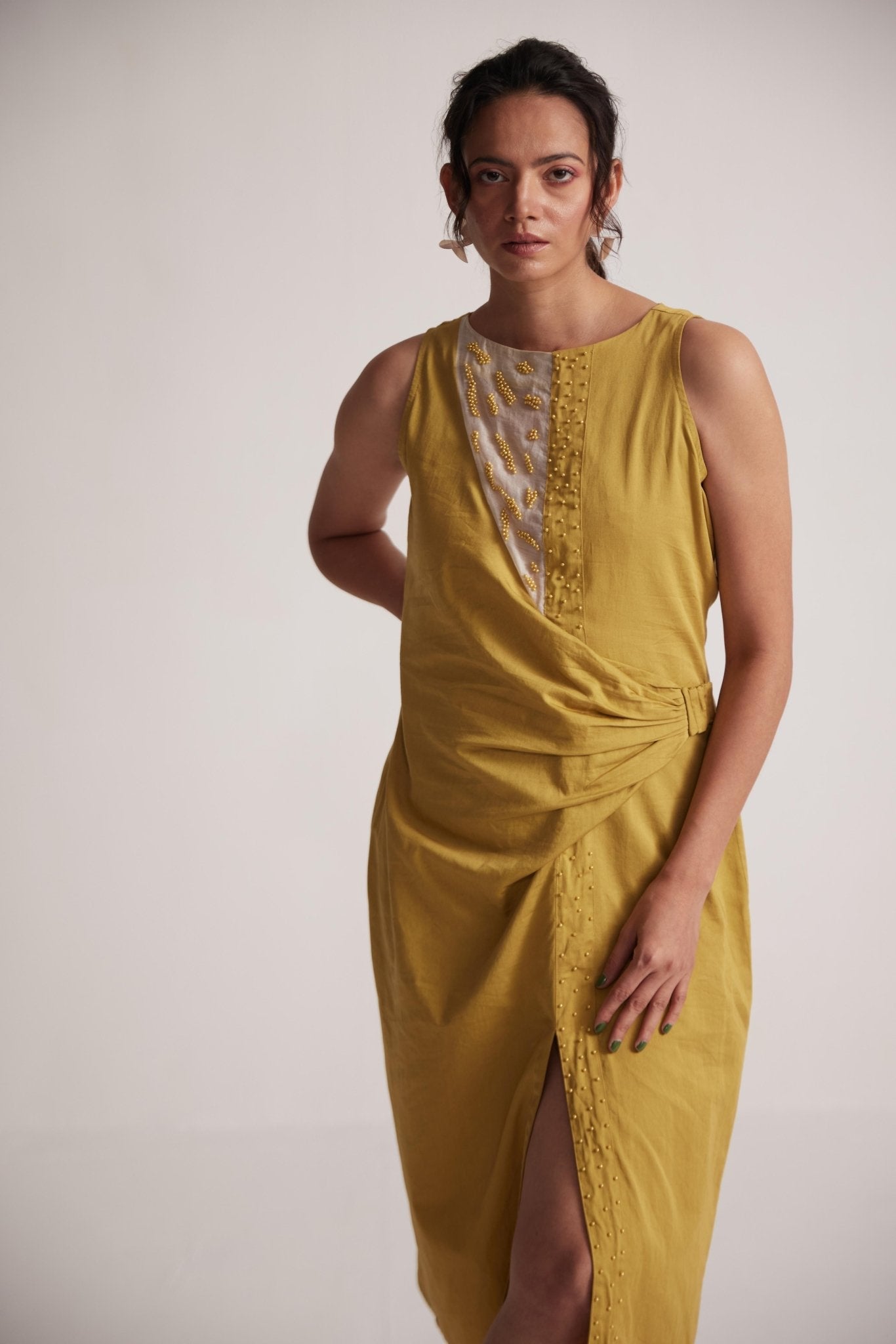 Stylera yellow draped midi dress with sleeveless design and intricate front detailing
