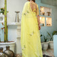 Elegant yellow floral organza saree with intricate embroidery, perfect for special occasions