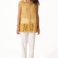 Stylera yellow organza sleeveless shirt with button front and floral ruffle detailing worn with white pants