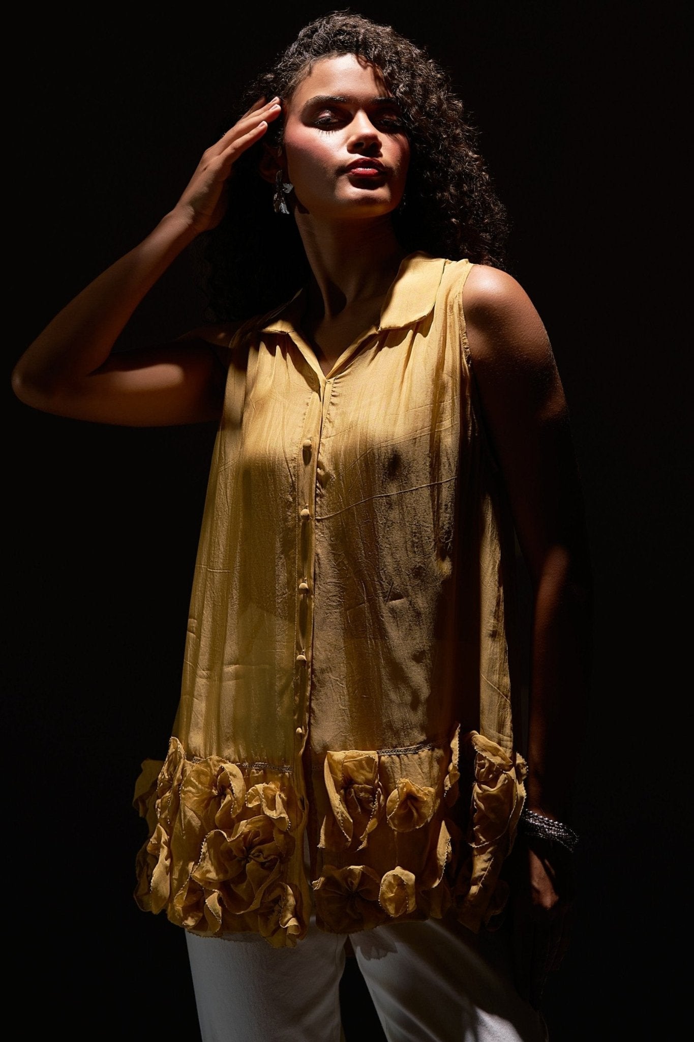 Stylera yellow organza sleeveless shirt with button front and floral ruffle hem