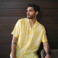 Stylish yellow oversize shirt for men with a unique pattern, perfect for casual summer outings