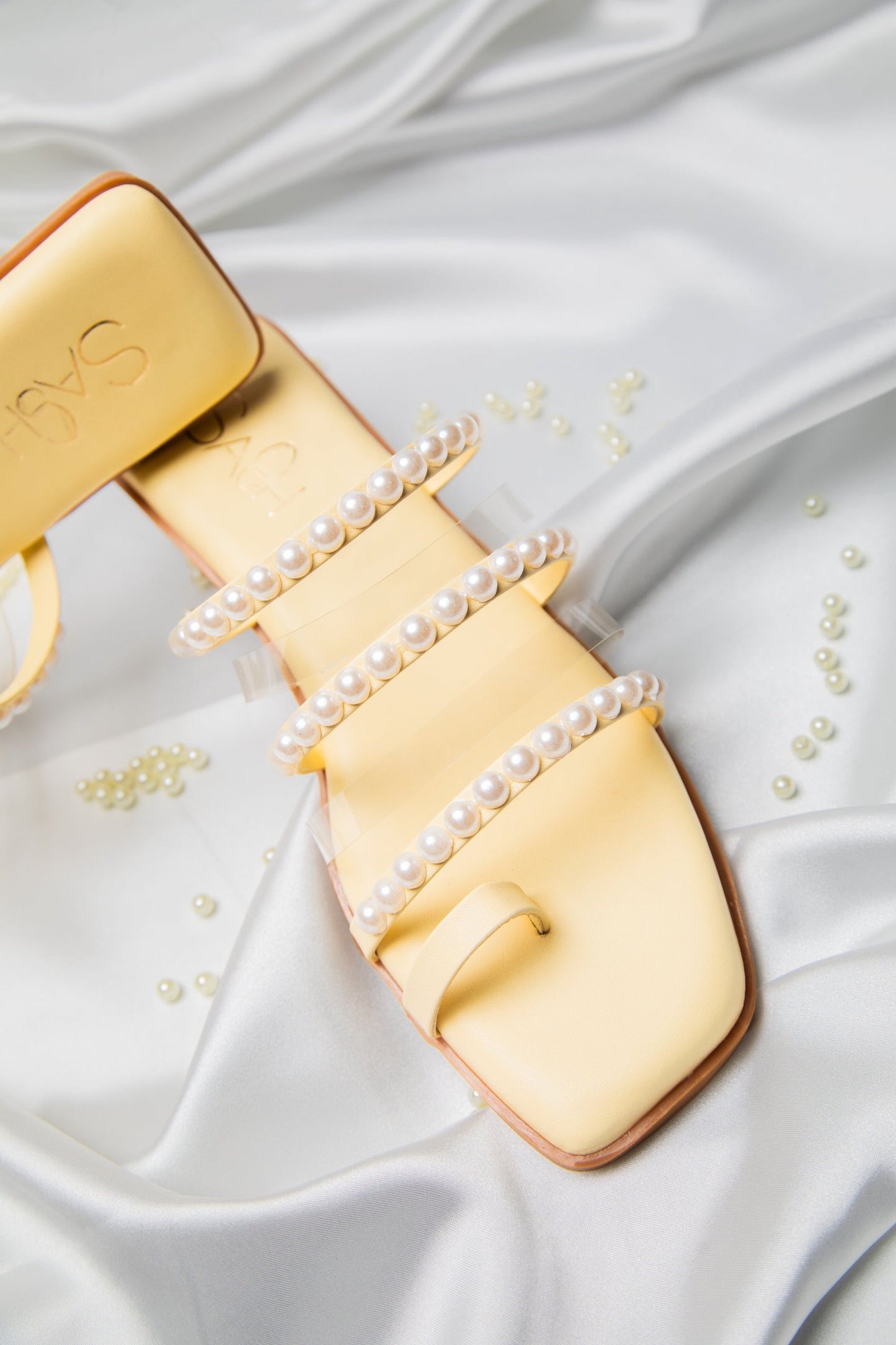 Stylera yellow pearl sandals for women featuring square toe and pearl-adorned straps